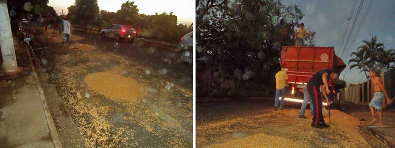Incidente com carreta faz parte de carga de milho ficar espalhada pela rua